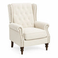 Sillón individual tapizado en tela color crema con respaldo capitoné y tachuelas de metal patas de madera 85 x 78 x 98 cm estilo clásico
