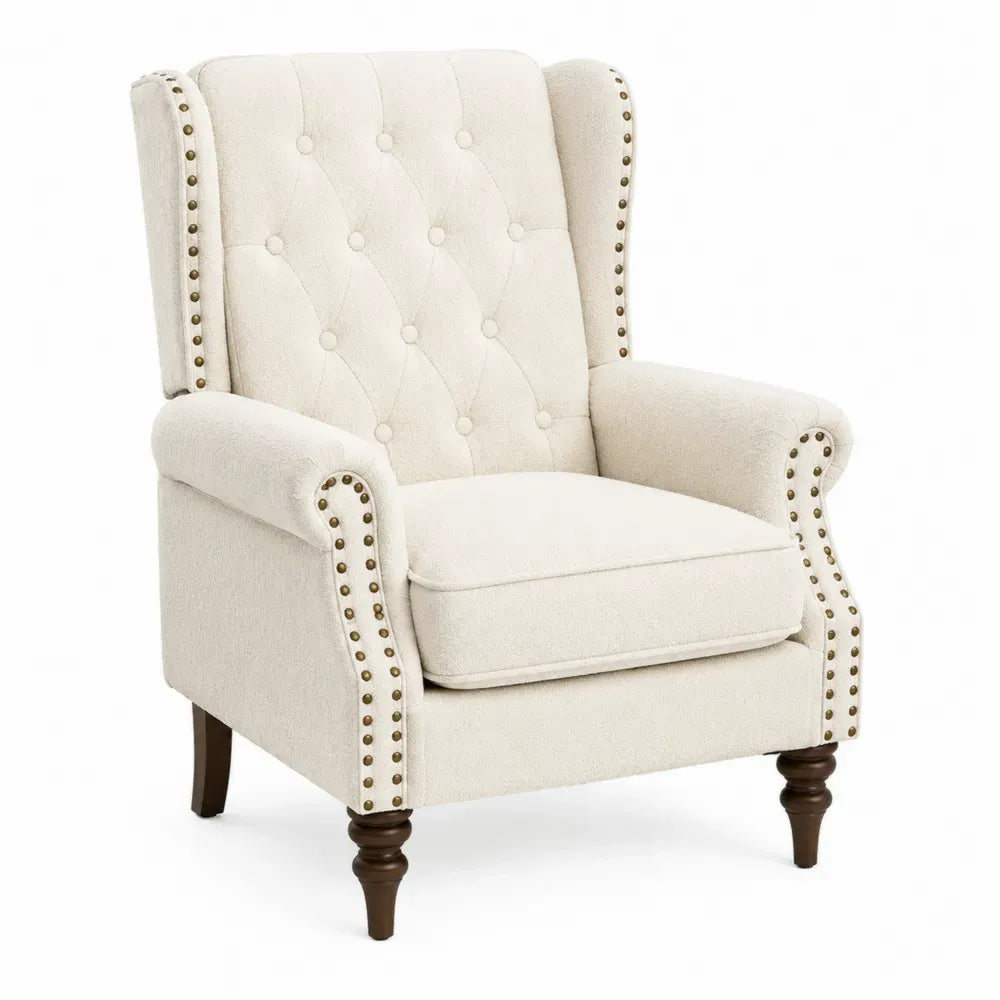 Sillón individual tapizado en tela color crema con respaldo capitoné y tachuelas de metal patas de madera 85 x 78 x 98 cm estilo clásico
