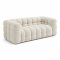 sofá de 3 plazas tapizado en bouclé crema con diseño acolchado y brazos redondeados 240 x 100 x 72 cm