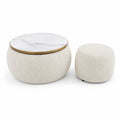 conjunto de mesa auxiliar redonda y reposapiés tapizados en bouclé crema con tapa efecto mármol blanco borde dorado mesa 60 x 45 cm