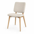 Silla de comedor tapizada en poliéster beige con respaldo rectangular redondeado y patas de madera natural 45 x 52 x 82 cm